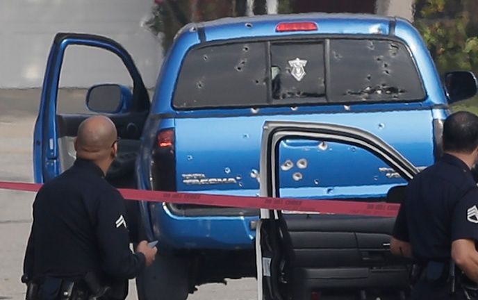 Police shoot blue toyota truck